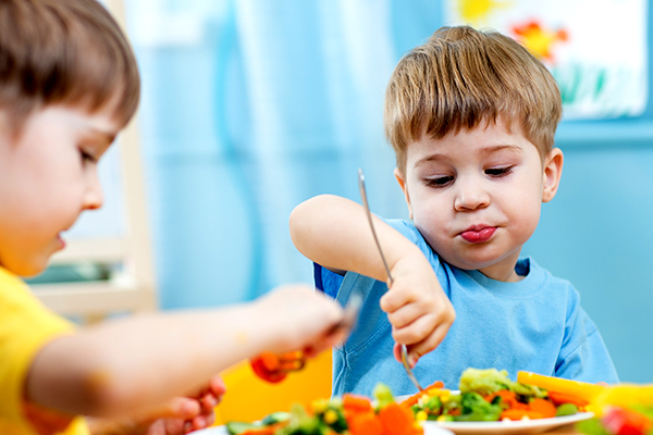 Kids,Children,Eating,Vegetables,In,Kindergarten,Or,At,Home